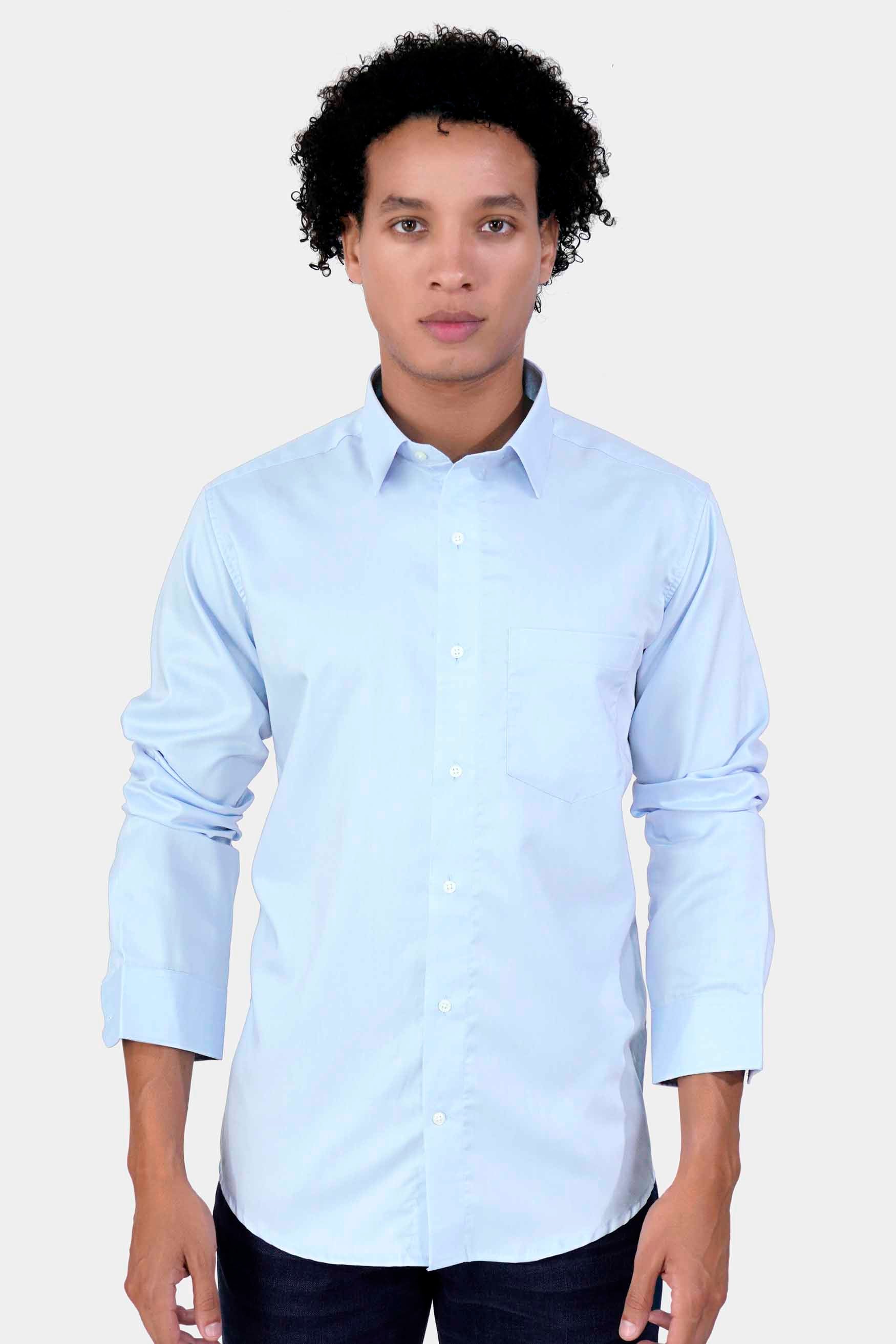 Dressing in a light blue shirt, gray pants, a pattern - stock photo 4267635  | Crushpixel